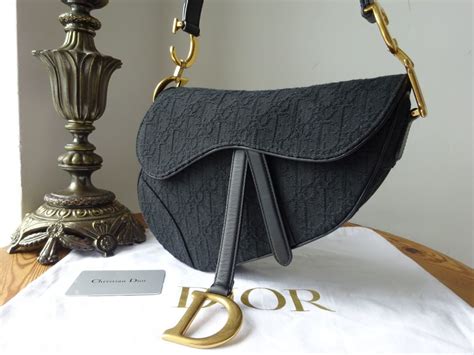 pochette saddle dior|dior saddle bag original.